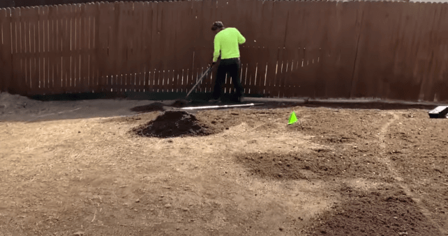 Leveling lawn with compost